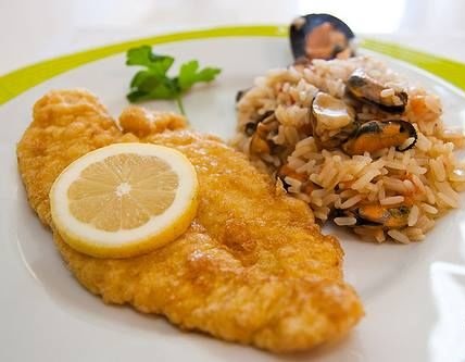 Filetes pescada arroz marisco